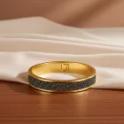 Esprit Női karkötő nemesacél arany GLAM fekete ESBA11259B600-1